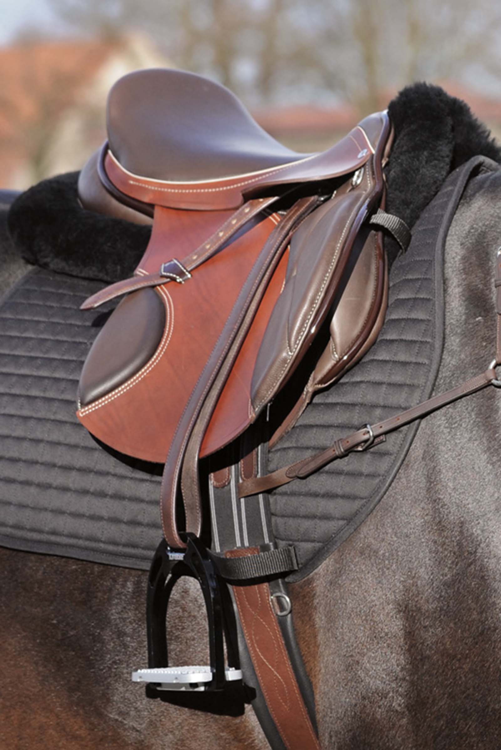 Kavalkade fårskinnspad med fickor